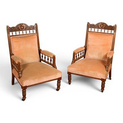 Lot 669 - A pair of Victorian carved oak armchairs.