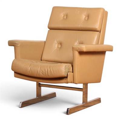 Lot 627 - A beige upholstered armchair, on a chrome base.
