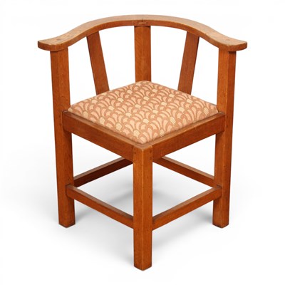 Lot 600 - In the Manner of Heals, an oak corner chair, w....
