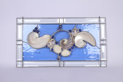 Lot 704 - A stained glass art panel with shells in the...