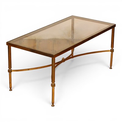 Lot 664 - A brass and glass coffee table, 92x47cm