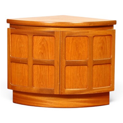 Lot 590 - A mid century teak corner unit