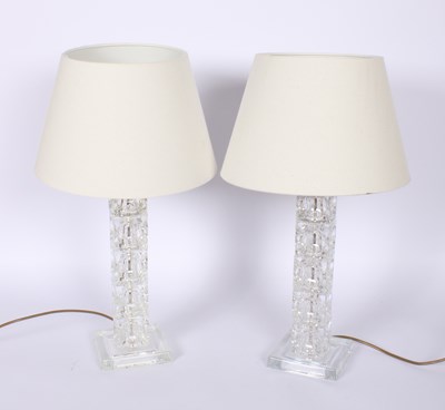 Lot 597 - A pair of modern glass table lamps and shades