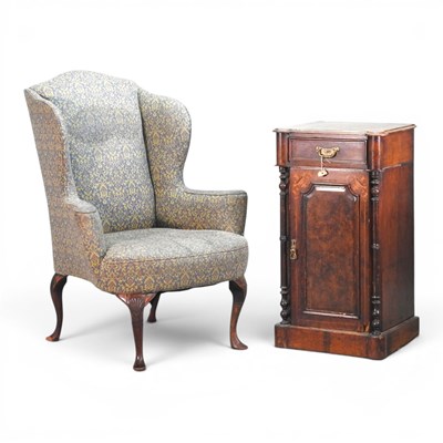 Lot 492 - An early 20th century floral upholstered wing...