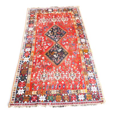 Lot 537 - A Persian Qashgai carpet, with two central...