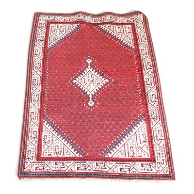 Lot 264 - A Persian Arak rug, the central medallion on a...