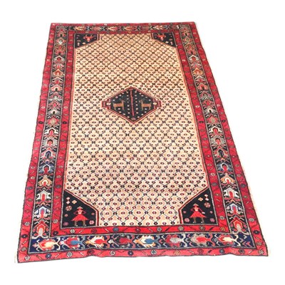 Lot 381 - A Persian Bidjar rug, with diaper designs, on...