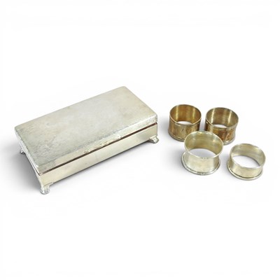 Lot 66 - Two napkin rings, 34g, together with two...