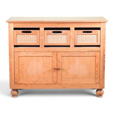 Lot 632 - A modern pine cabinet, with wicker drawers, on...