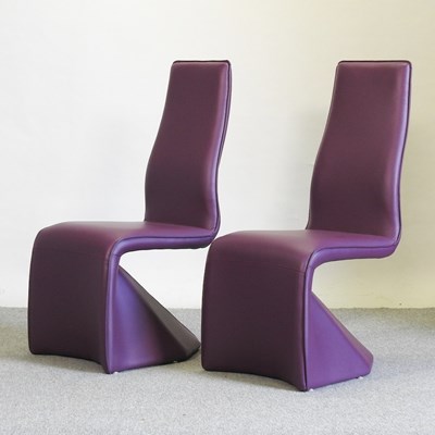 Lot 635 - A pair of modern purple upholstered chairs