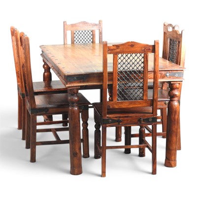 Lot 503 - A sheesham dining table, on turned legs,...