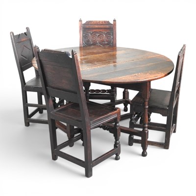 Lot 259 - An 18th century oak gateleg dining table,...