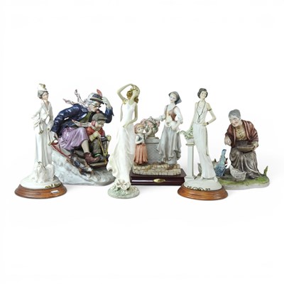 Lot 255 - A Capodimonte figure of a sled, 28cm high,...