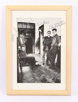 Lot 477 - A signed photograph of Madness, including...