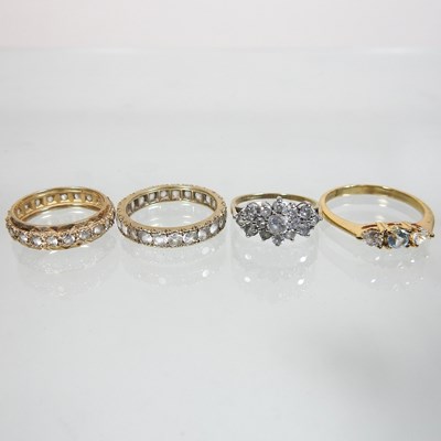 Lot 12 - An unmarked diamond full hoop eternity ring