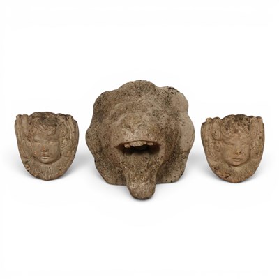 Lot 606 - A reconstituted stone lion's mask garden...