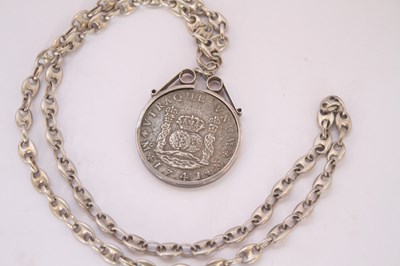 Lot 25 - An 18th century Spanish eight reales coin,...
