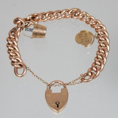 Lot 17 - A 15 carat gold curb link charm bracelet