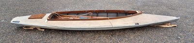 Lot 653 - A vintage wooden framed canoe