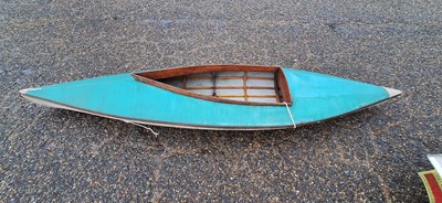 Lot 654 - A vintage wooden framed canoe