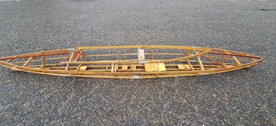 Lot 655 - A vintage wooden canoe frame