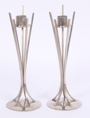Lot 235 - A pair of modernist metal candlesticks, 25cm high