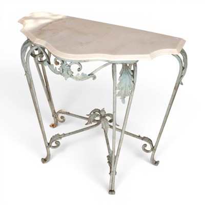Lot 593 - A verdigris metal marble topped console table,...
