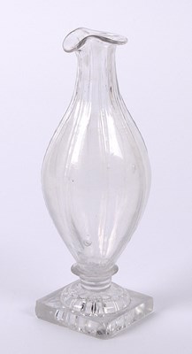 Lot 143 - A Regency glass cruet, having a lobed body and...