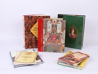Lot 675 - A collection of reference books on carpets and...