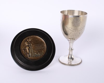 Lot 76 - A reproduction bronze memorial plaque...
