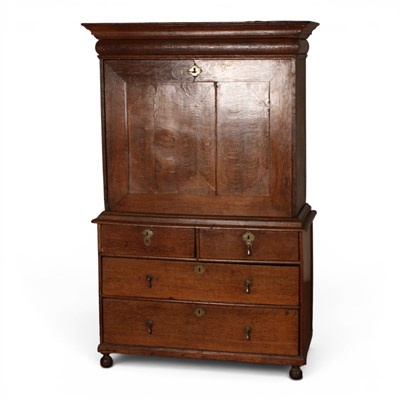 Lot 538 - A Georgian oak escritoire, the fall front...