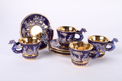 Lot 740 - A Capodimonte gilt and blue tea set