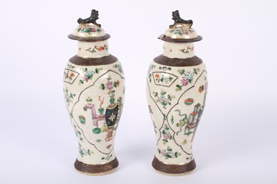 Lot 136 - Two Chinese Nanking vases, enamel decorated...