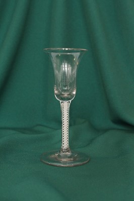 Lot 105 - An 18th century opaque twist wine glass, circa...