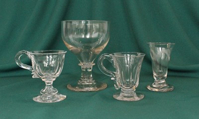Lot 128 - A collection of four 19th century glasses...