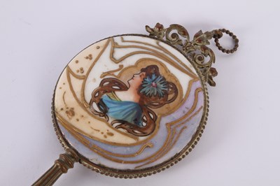 Lot 251 - An Art Nouveau enamel decorated dressing mirror
