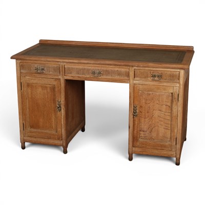 Lot 562 - An early 20th century limed oak pedestal desk,...