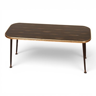 Lot 605 - A mid-century black and gold coffee table, 40...