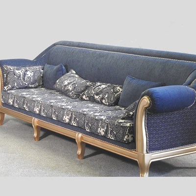 Lot 305 - A large gilt framed blue upholstered sofa