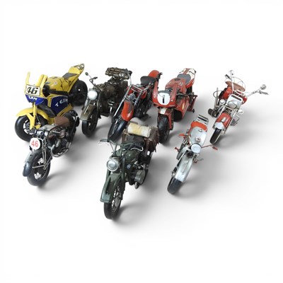 Lot 498 - A collection of tinplate model motorcycles,...