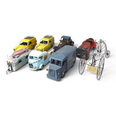 Lot 487 - A collection of tin model vehicles, the...