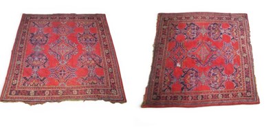 Lot 580 - A pair of Persian rugs, each on a red ground...