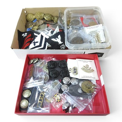 Lot 273 - A collection of military badges, buttons and...