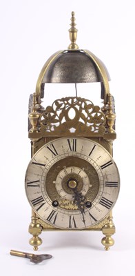 Lot 148 - A French antique brass lantern clock made by A....