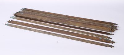 Lot 771 - A collection of vintage brass stair rods (12)...