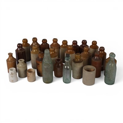 Lot 742 - A collection of antique stoneware bottles,...