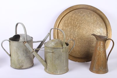 Lot 766 - A collection of brassware including engraved...