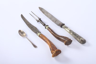 Lot 60 - A two piece carving set with stag antler...