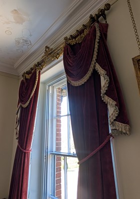 Lot 516 - Two pairs of red velvet curtains, together...