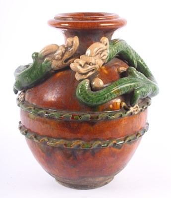 Lot 115 - A Chinese sancai pottery vase, relief...